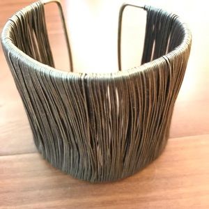 Gold wire cuff bracelet.